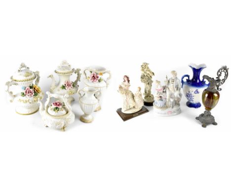 A Capodimonte porcelain six-place tea set with embossed putti decoration on gilt and black ground, three other Continental pa