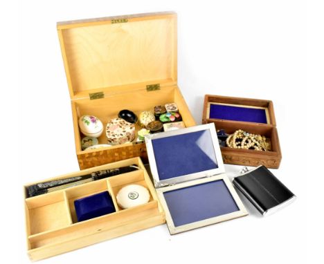 A large marquetry jewellery box containing a quantity of decorative boxes and pillboxes to include a metal Fabergé-style exam