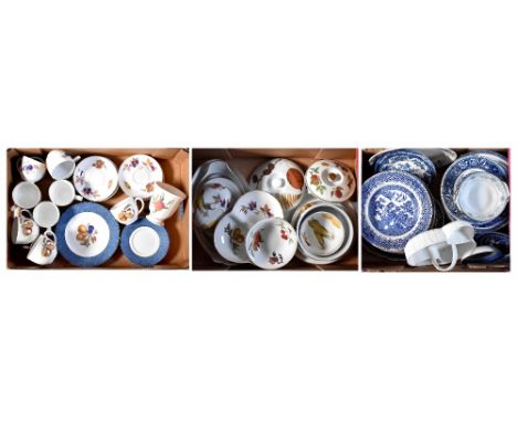 A Royal Worcester 'Evesham' ware part dinner and tea service comprising covered tureens, three-sectioned plate, graduated ova