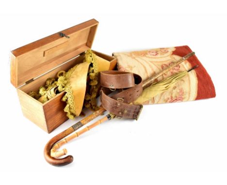A large mahogany box containing vintage gold velvet fabric curtain trims, each with gold passementerie trim, a large wool Aub