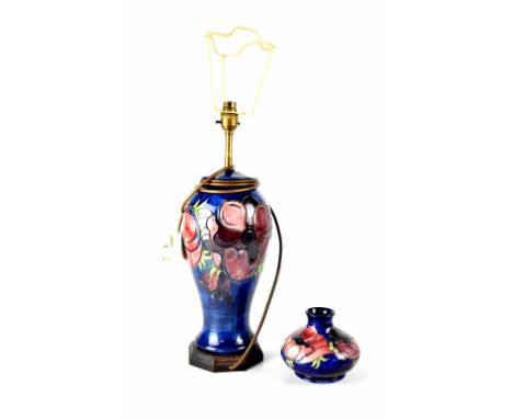 A large Moorcroft table lamp in the 'Anemone' pattern on blue ground, height to shoulder 35cm, height to top of shade 68cm an