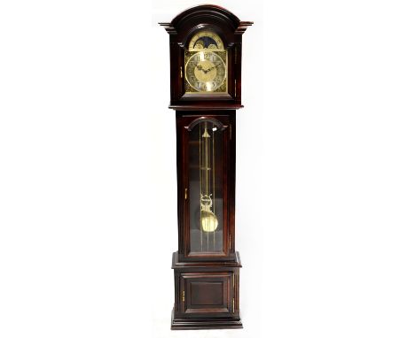 A Georgian-style mahogany longcase clock, the silvered dial set Arabic numerals and moon phase enclosing an eight-day movemen