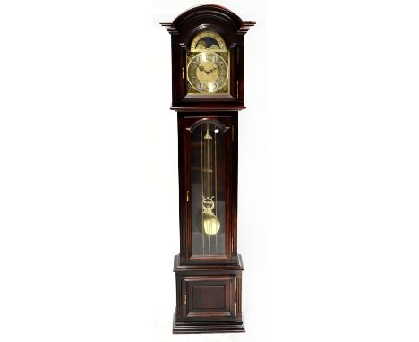 A Georgian-style mahogany longcase clock, the silvered dial set Arabic numerals and moon phase enclosing an eight-day movemen