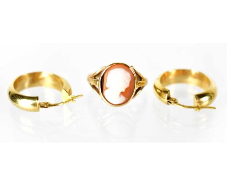 A 19th century 9ct gold cameo ring, size J/K, stamped and a pair of 9ct gold hallmarked hoop earrings, combined approx. 4.9g 