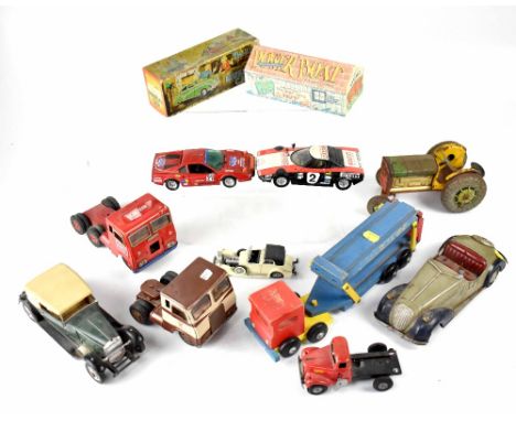 Various vintage diecast, tin-plate and wooden vehicles to include a Tri-ang No2 Minic Musical car, boxed, a reproduction 'Bat