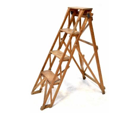 A vintage wooden folding stepladder with four treads, height 118cm.