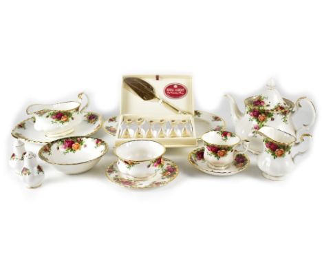A Royal Albert 'Old Country Roses' part tea and dinner service comprising teapots, teacups, saucers, milk jug, plates, gradua