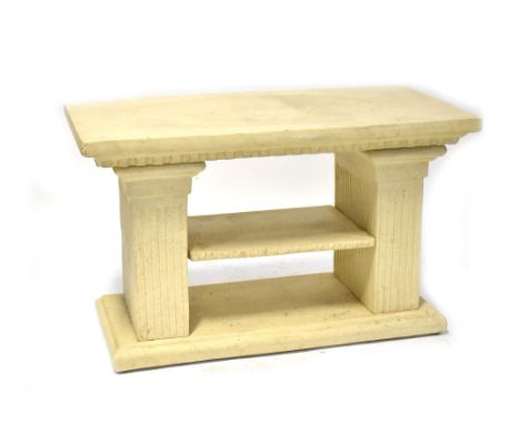 A stone-effect occasional table with rectangular top on twin column supports with single shelf and stepped rectangular base, 