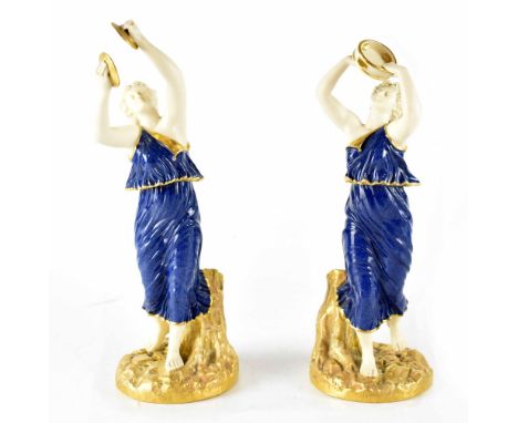A pair of early 20th century Royal Worcester Classical-style figures of female dancers, one with tambourine, the other with c