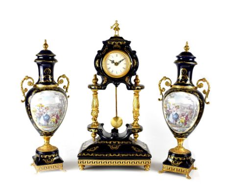 A modern Limoges porcelain and metal mounted clock garniture, the painted dial set with Roman numerals and enclosing a batter