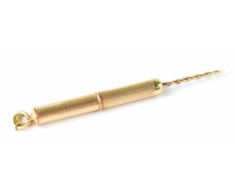 A hallmarked 9ct gold retractable twist end toothpick with engine turned body, Birmingham 1965, length closed 4.5cm, approx 5