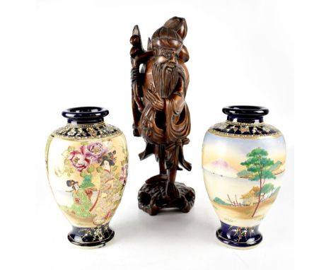 A pair of Japanese Satsuma vases of baluster form decorated with scenes of Mount Fuji and scenes of a geisha in a garden, hei