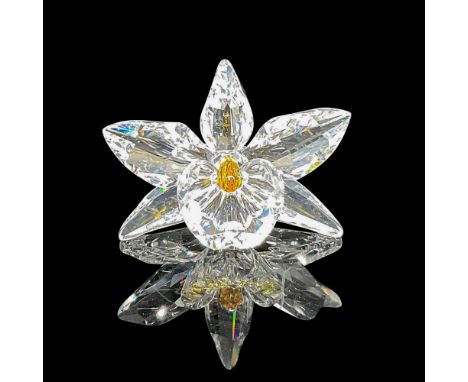 Blossomed floral design in clear faceted crystal with pale yellow center. Swarovski backstamp. 7478 000 003. This item has it
