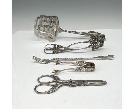 Mixed lot of utensils: Bread tongs with ornate handles 9" - Stainless Germany impressed mark, filigreed biscuit tongs 7" - Wa