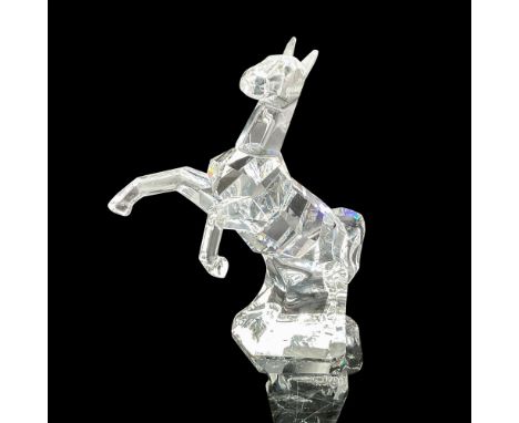 Bold, rearing clear crystal figure has strong lines of detail. Swarovski backstamp.7685 000 009. This item has its original b