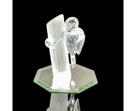 1998 Annual Edition figurine designed of clear crystal with colored crystal eyes perched on satin finished crystal tree. Swar