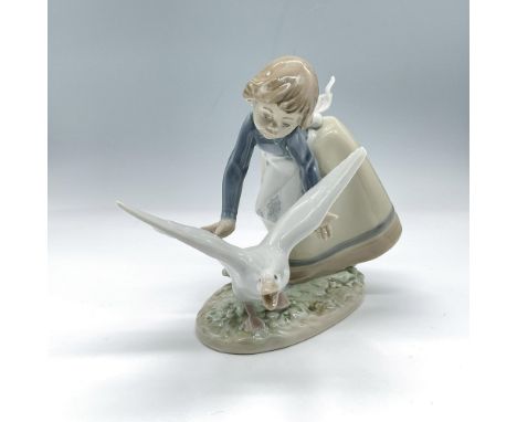 Glossy, hand-made porcelain. Delicately crafted in soft pastel hues. It captures a dynamic scene where a girl, dressed in a s