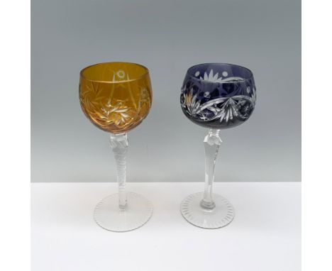 Two glasses, one radiant purple, the other bold orange, featuring intricate star and foliage designs. Dimensions of the large