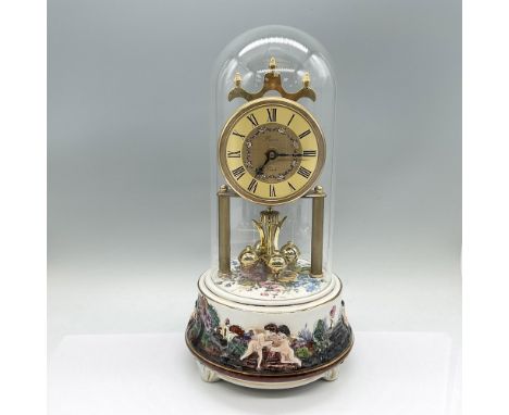 Also known as a torsion pendulum clock or 400-day clock, this particular piece has a gilded Franz Quartz clock face with four