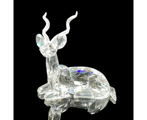 Annual edition Inspiration Africa figure, created in brilliant clear crystal with jet crystal eyes and satin horns. Swarovski