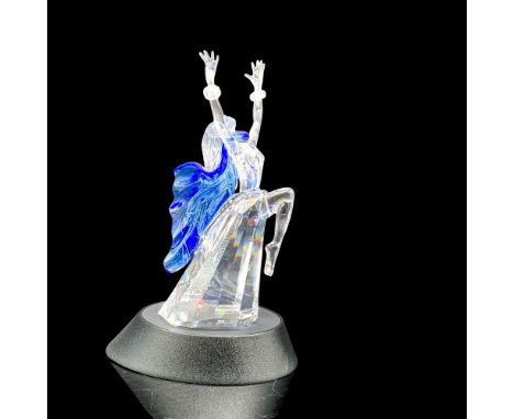A set of 3 Swarovski pieces, Isadora, a crystal figure of a woman in a dance position, the 2002 plaque engraved with Isadora,