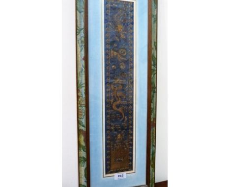 CHINESE TEXTILES: A silk banner finely worked in gold threads with a dragon, exotic bird and auspicious motifs on a rich blue