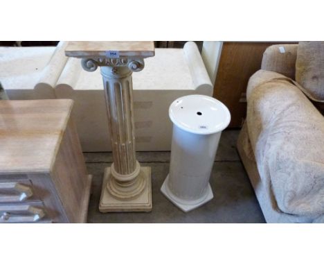 An ionic column jardinière stand and a ceramic stand