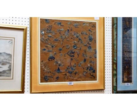 CHINESE TEXTILES: A silk banner finely worked in shades of blue and metal threads with foliate motifs on a brown ground. 16''