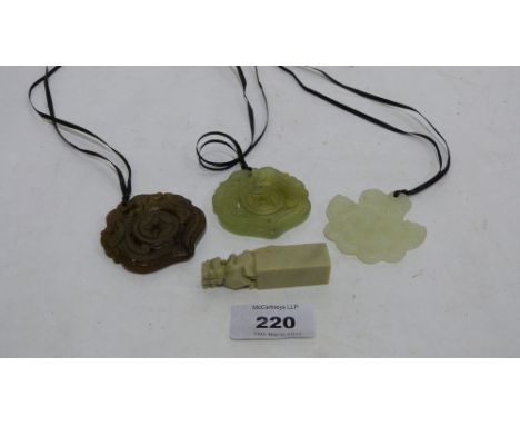 Three Chinese hardstone pendants and a seal