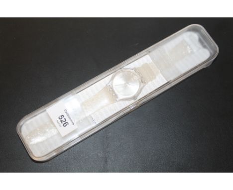 A BOXED SWATCH WATCH 