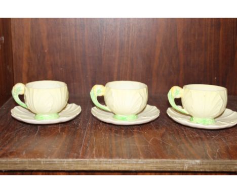 A SMALL BOX OF CARLTONWARE, CUPS AND SAUCERS