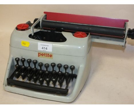 A PETITE CHILDS TYPEWRITER