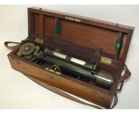 A CASED VINTAGE KEYZOR AND BENDON MILITARY STYLE COMBINATION TELESCOPE AND COMPASS WITH SPIRIT LEVEL