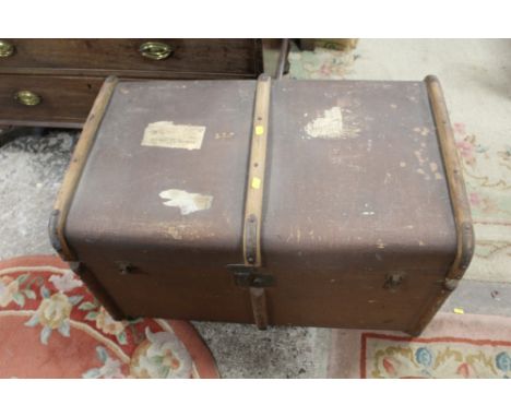 A VINTAGE TRAVEL TRUNK