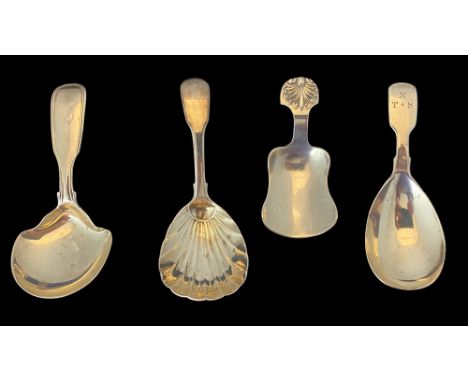 A group of four silver caddy spoons
Comprising of a shovel shaped spoon, Barker Bros Silver Ltd, Birmingham 1936, a spoon wit