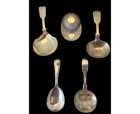 A group of five silver caddy spoons
Comprising of a Jockey cap caddy spoon, marked 925. STERLING, an oval bowl spoon, W S Ltd