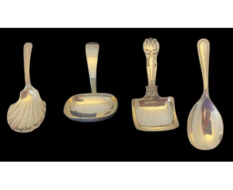 A group of four silver caddy spoons
Comprising of one with a shell bowl, Thomas Whipham, London, 1794, an oval bowl,&nbsp; J 