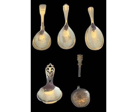 A group of five silver caddy spoons
Comprising of two similar with oval bowls, one with trefoil terminal, Atkin Bros, Sheffie