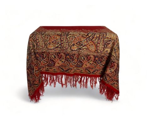 A 19th century red, brown and blue paisley cotton shawl together with another shawl
The first (a.f), 146cm x 144cm approximat