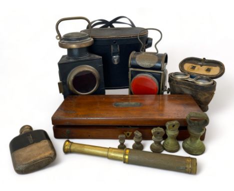 A group of miscellaneous vintage and antique objects
Comprising of a brass pocket telescope, a hip flask, a set of five weigh
