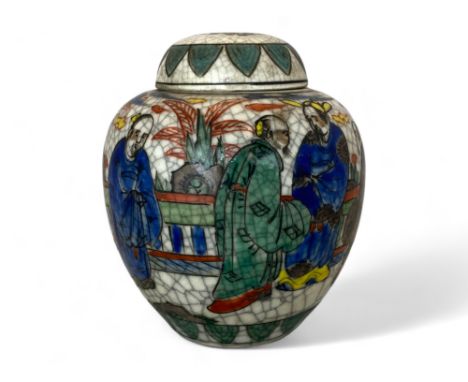 An early 20th century Chinese crackle glaze and enamel ginger jar
Of ovoid form polychrome decorated with figures, signed to 
