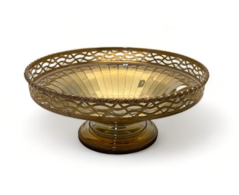 A silver pierced edge fretted dish, Adie Brothers Ltd, Birmingham, 1946
Of circular footed form, 11cm diameter. (75g)