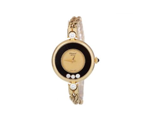 CHOPARD HAPPY DIAMONDS EIGHTEEN CARAT GOLD QUARTZ WRIST WATCH, the round dial lacking hour markers, 24mm case, with floating 