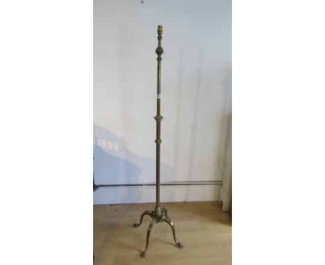 A brass extending standard lamp, will need re-wiring, otherwise good condition 