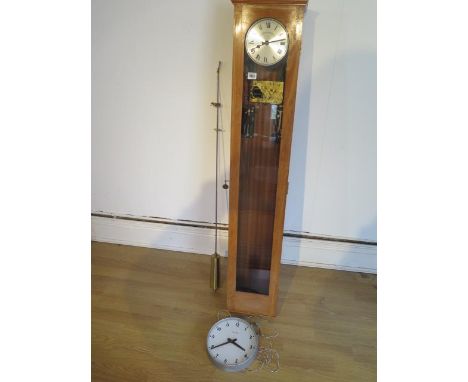 A 20th century mahogany cased chronomatic electric master clock, 132cm tall, with a synchronome wall clock 24cm diameter 