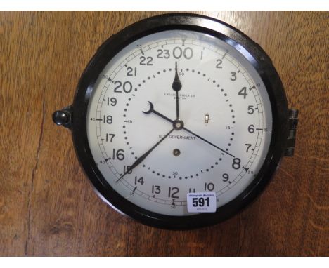 A US Government military bakelite bulkhead clock by Chelsea Clock Co Boston with 8 1/2" black dial, good condition, running 