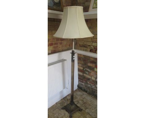 An adjustable Adams style metal standard lamp, tested and working 