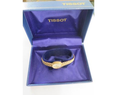 A 9ct yellow gold Tissot bracelet manual wind ladies watch - 15mm case - approx weight 22 grams - with box and running 
