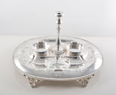 Victorian oval electroplated presentation desk stand, by Robert and Belk, oval platform on scrolled feet, width 24cm.