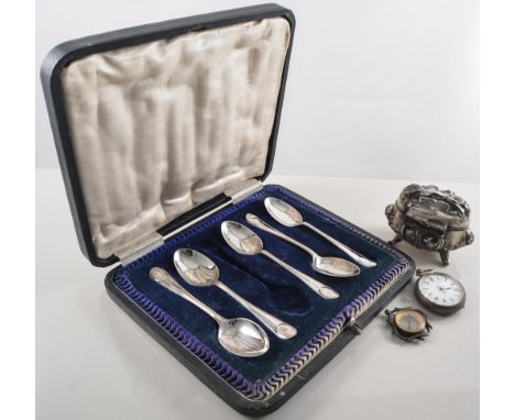 Velvet jewel box with a silver open face pocket watch, three fob watches, whistle, two bar brooches, fine silver teaspoons, s